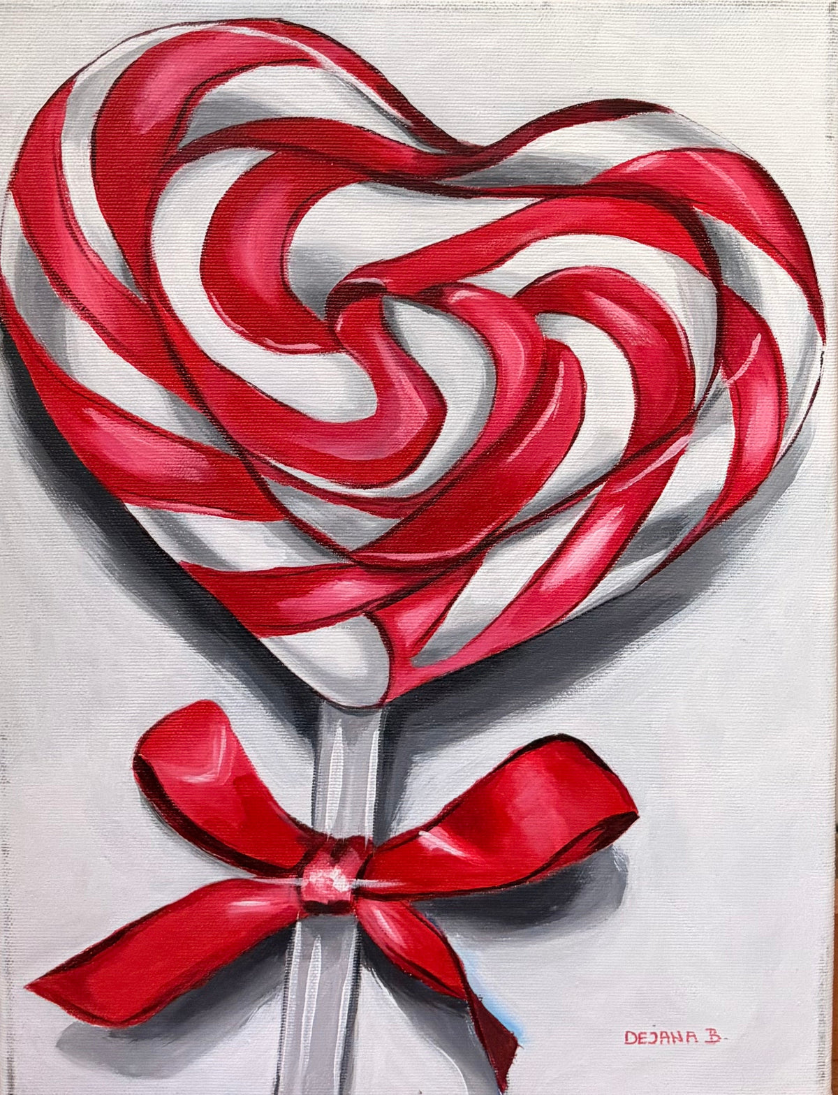 Lollipop — original acrylic painting on canvas, 30 × 40 cm, a large red and white swirled heart-shaped lollipop tied with a red satin bow on a soft grey background, painted with her feet by Dejana Nezic, Girl With Wings